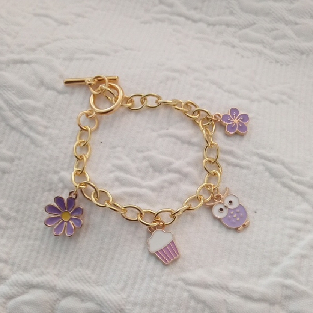 Goldtone Charm Bracelet with Purple Enamel Charms And Toggle Closure Women
